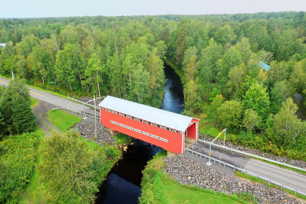 Aerial scene of Grandchamp Covered Bridge in Quebec, Canada